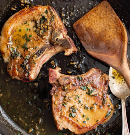 an image of pork chops on a skillet