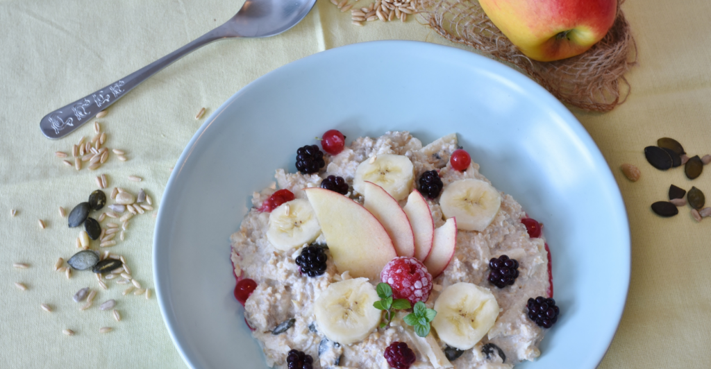 a stock image of oatmeal with fruit in it